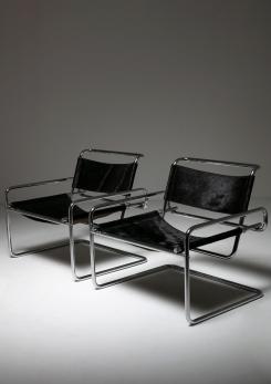 Compasso - Pair of Cantilever Steel chairs by Luigi Saccardo for Arrmet Compasso - Pair of Cantilever Steel chairs by Luigi Saccardo for Arrmet